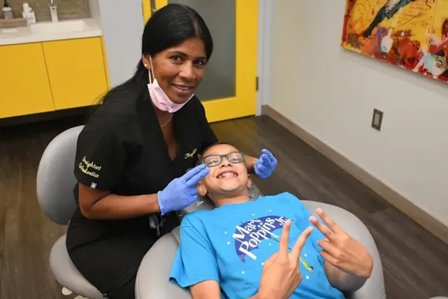 Orthodontic Assistant with Patient